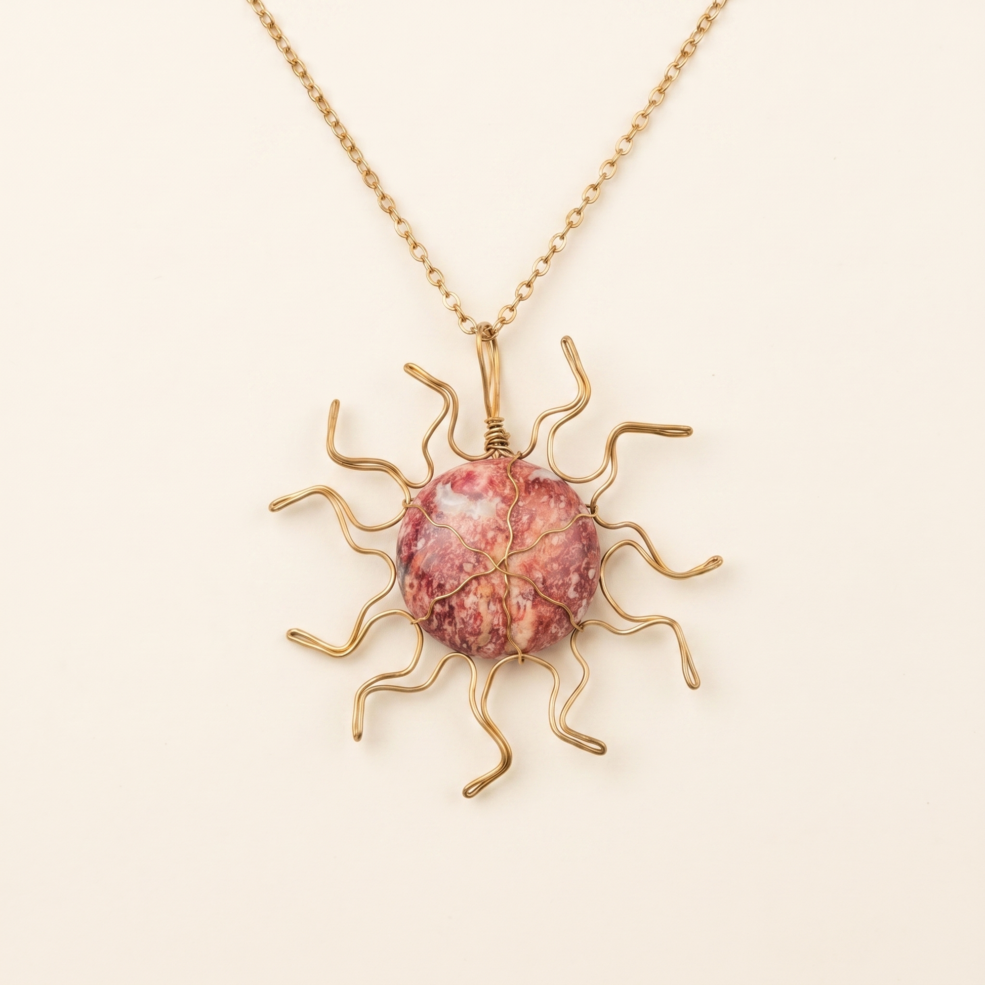 #45 One Piece – Rhodonite Sun Necklace Gold